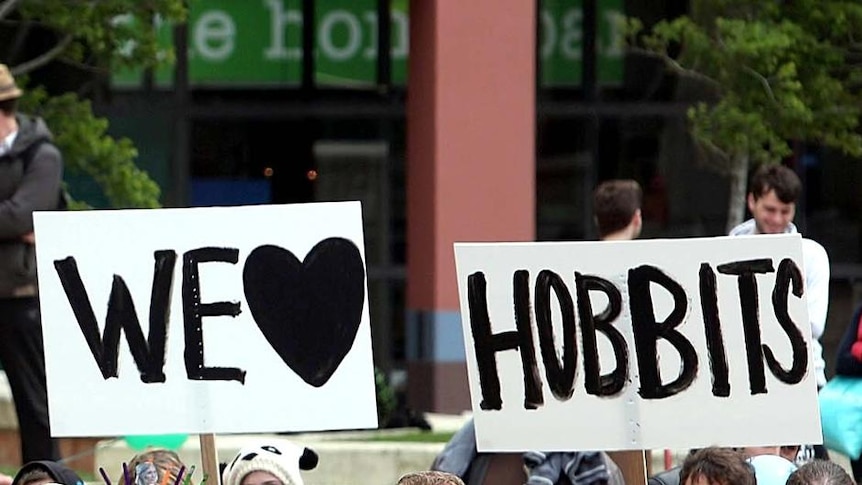 Hobbit supporters hold up posters during a protest at Civic Square in Wellington