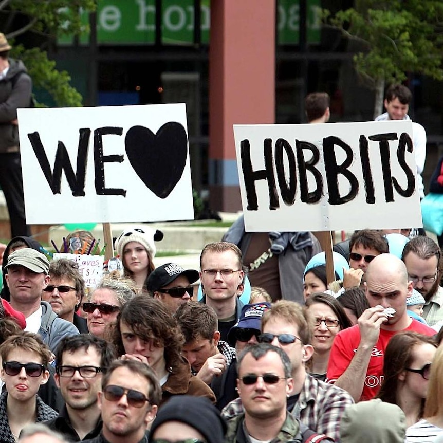 Hobbit supporters hold up posters during a protest at Civic Square in Wellington