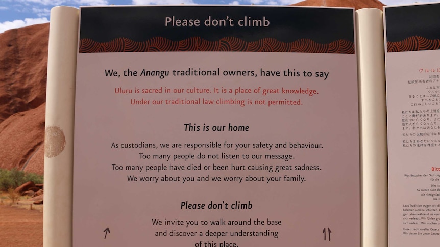 Sign at base of Uluru asking people not to climb