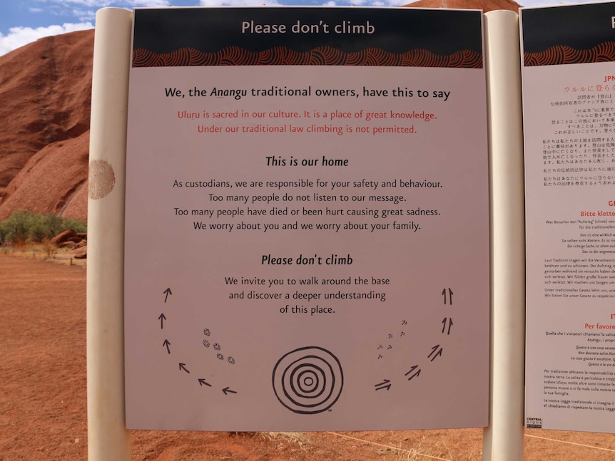 Sign at base of Uluru asking people not to climb