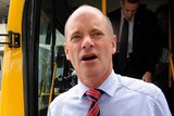 Campbell Newman campaigns on Brisbane City Council bus.