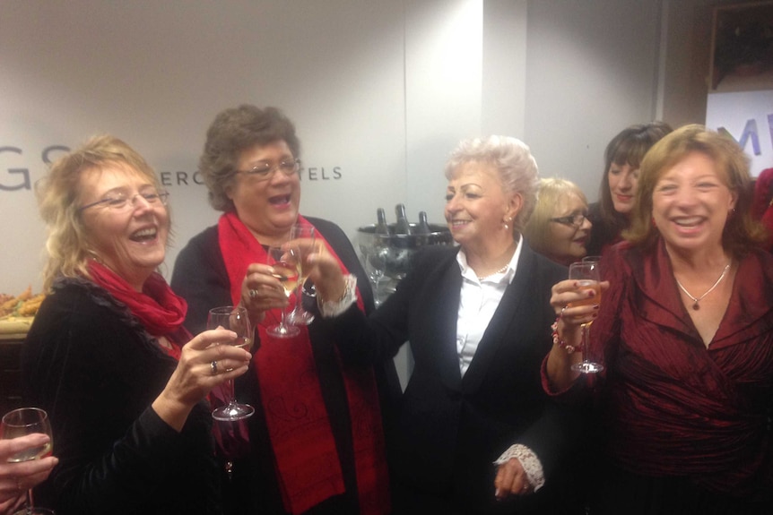 Roseanne Beckett with friends after her compensation win