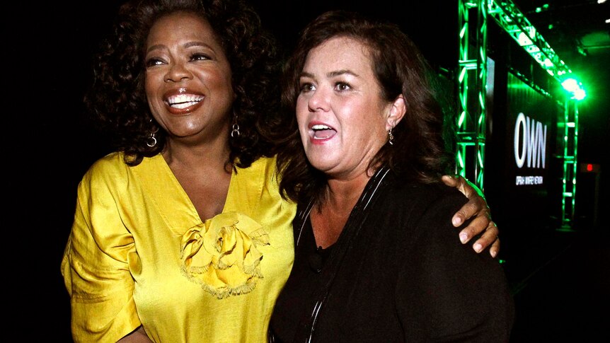 Oprah Winfrey (left) poses with Rosie O'Donnell