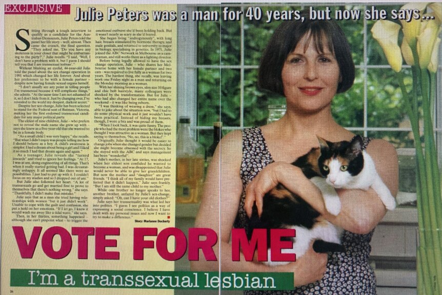 Magazine article showing photo of Julie holding cat and headline: Vote for me, I'm a transexual lesbian.