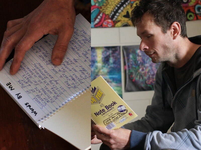 Hands holding notebook with handwritten page headed 'Words by me' and man looking at note book.