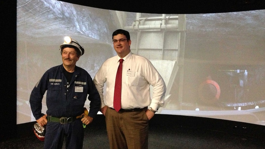 Engineer Martin Wilkinson (left) and Queensland Mines Minister Andrew Cripps at the new virtual reality mine safety centre.