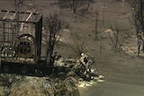 The wreckage of a truck caught in the bushfire that killed three people.