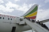 Passengers board an Ethiopian Airlines Dreamliner
