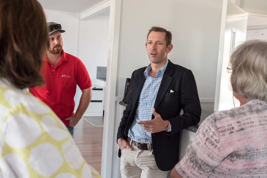 Hugh Bowman in Julia Creek talking to locals.