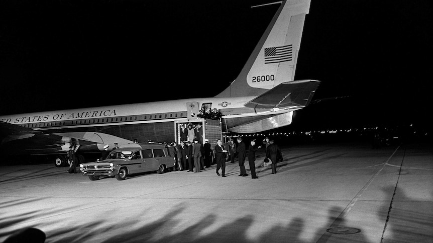 A US Navy ambulance waits for the body of JFK at Andrews Air Force Base.