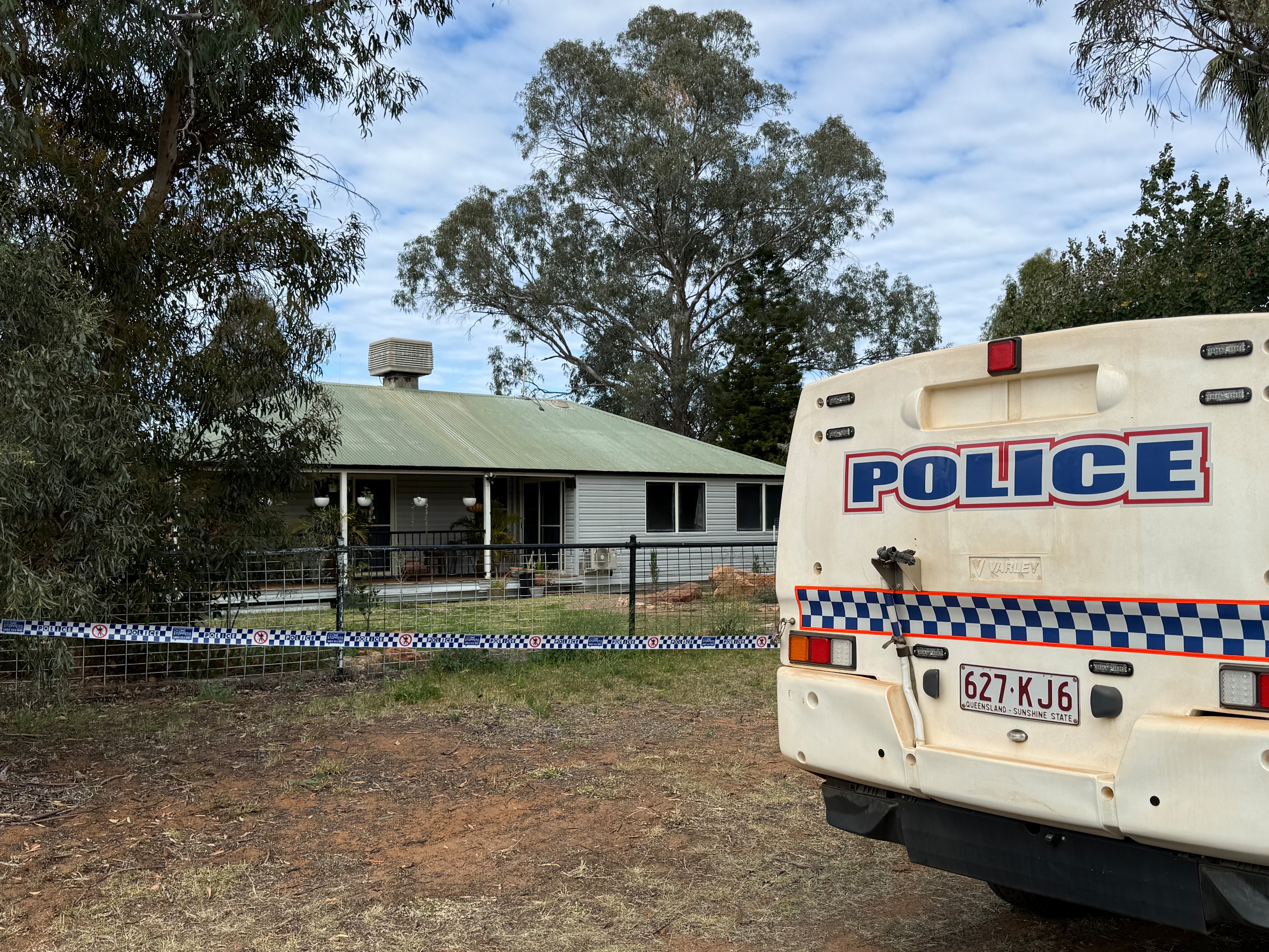 Police outside an outback Queensland home.