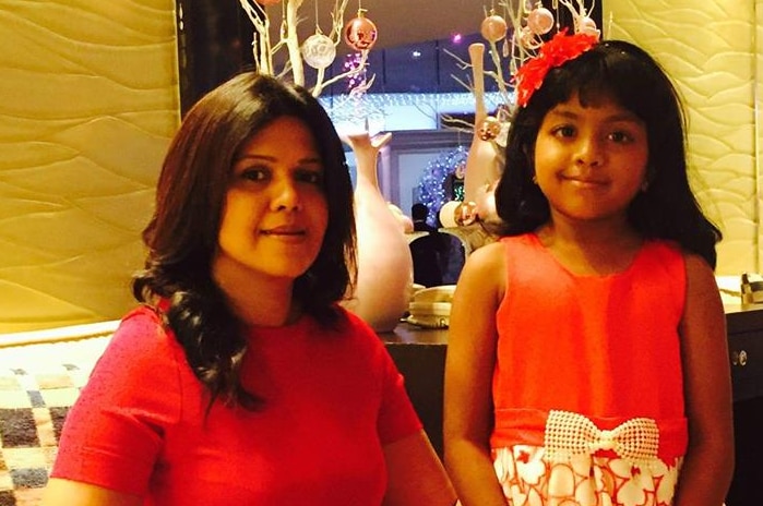 Manik Suriaaratchi poses for a photo with her daughter Alexandria.