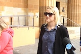 Hayley May Greenwood walking outside of court.