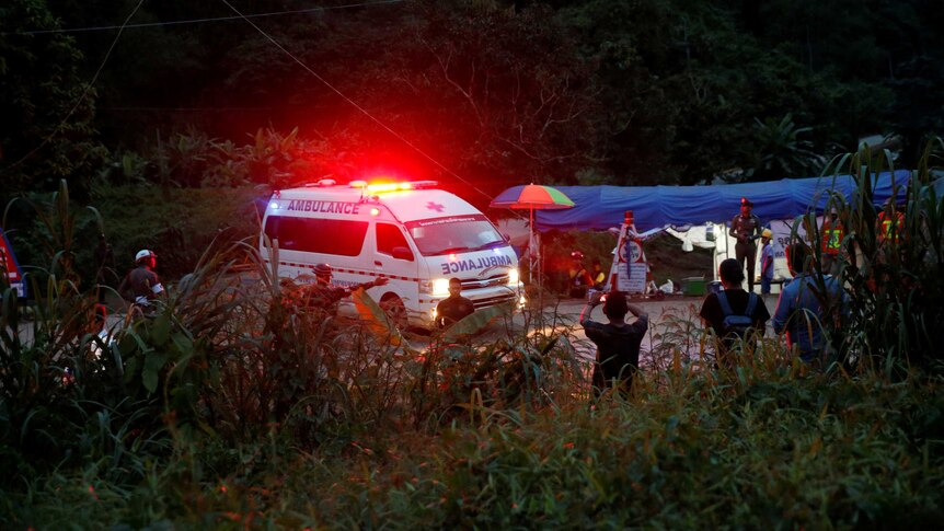 An ambulance leaves the Thai cave complex