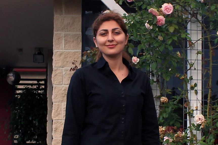 Dr Parisa Pour Ali outside the medical clinic where she has begun her career in Australia since migrating from Iran