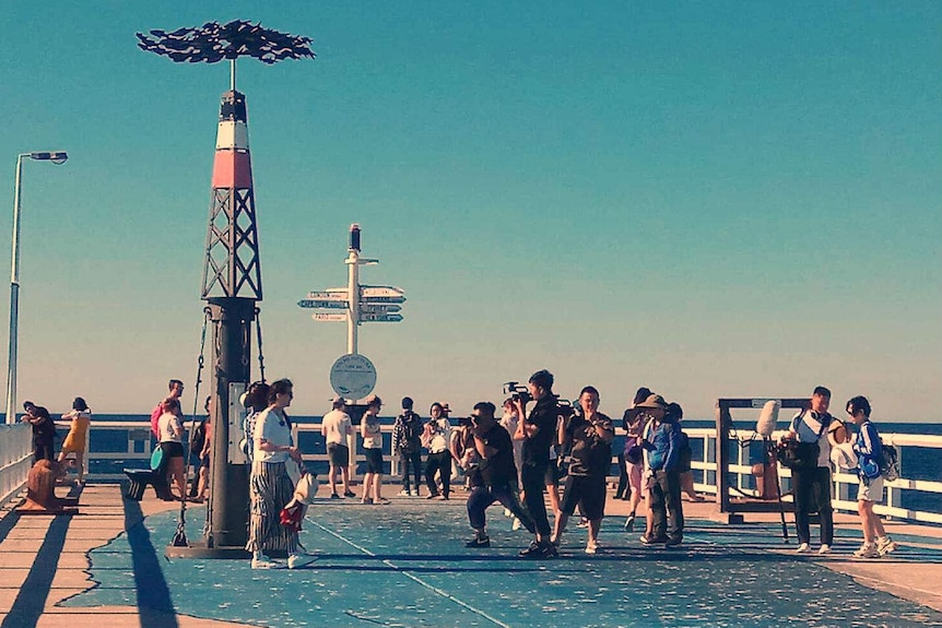 Cast of Chinese reality show 'Viva La Romance' on Busselton Jetty