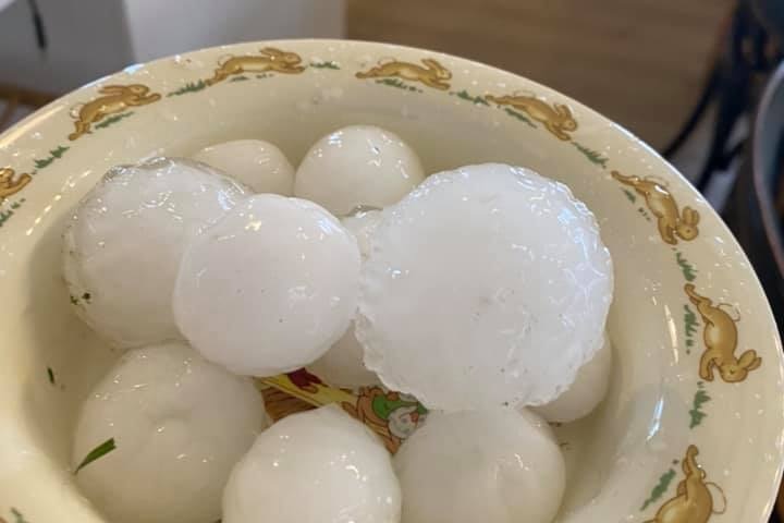 Large hail stones in a plate covered in rabbits.