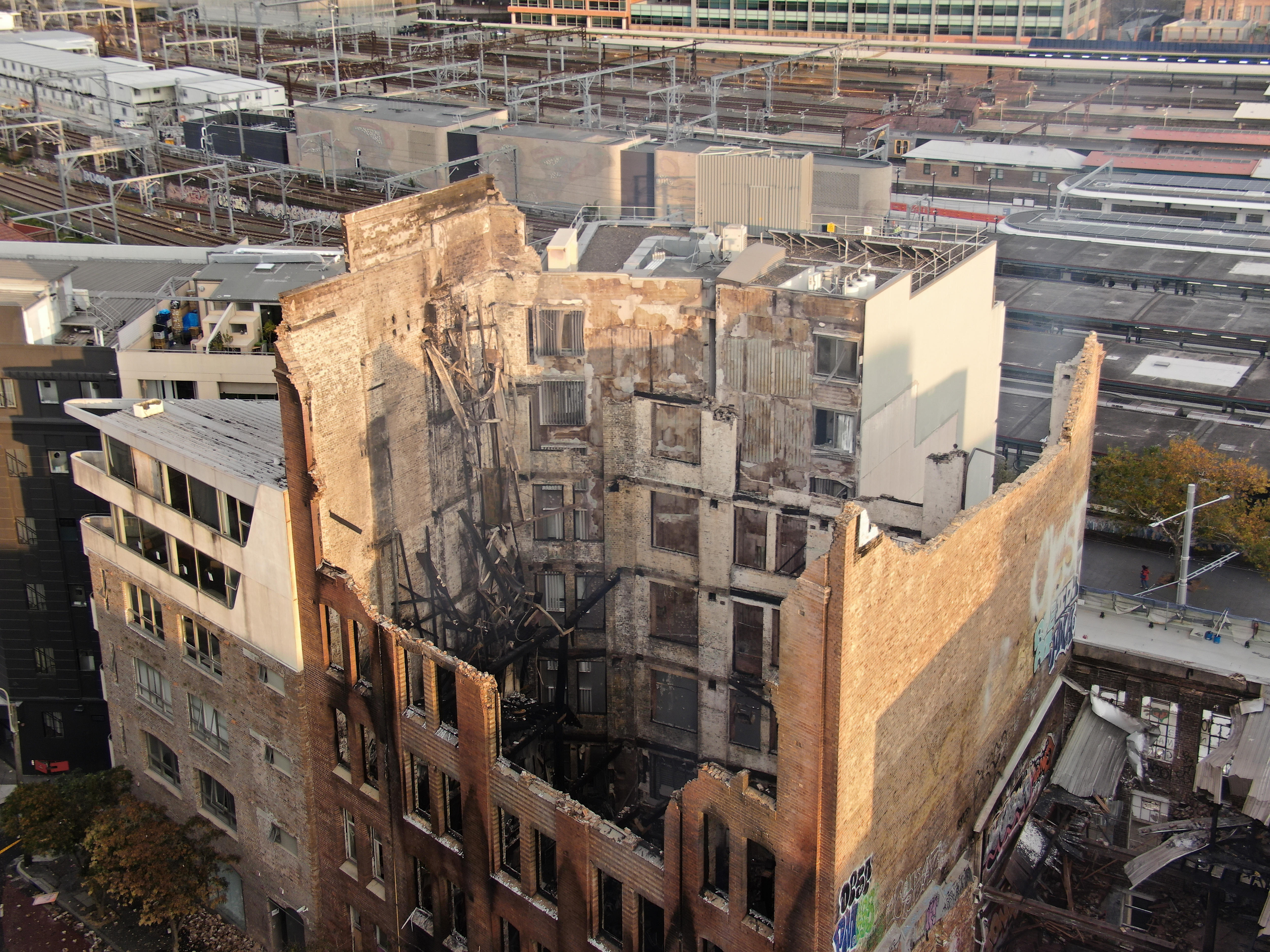 the remains of a building after it was gutted by fire