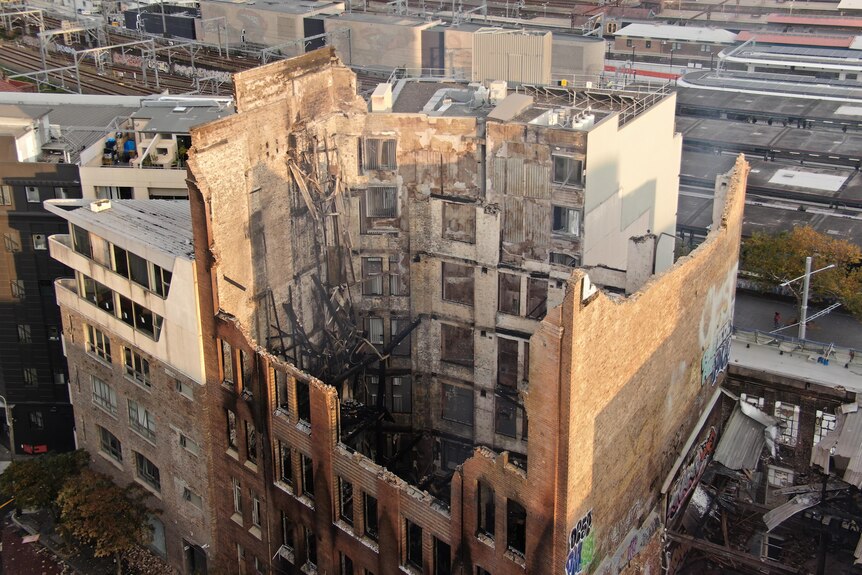 the remains of a building after it was gutted by fire