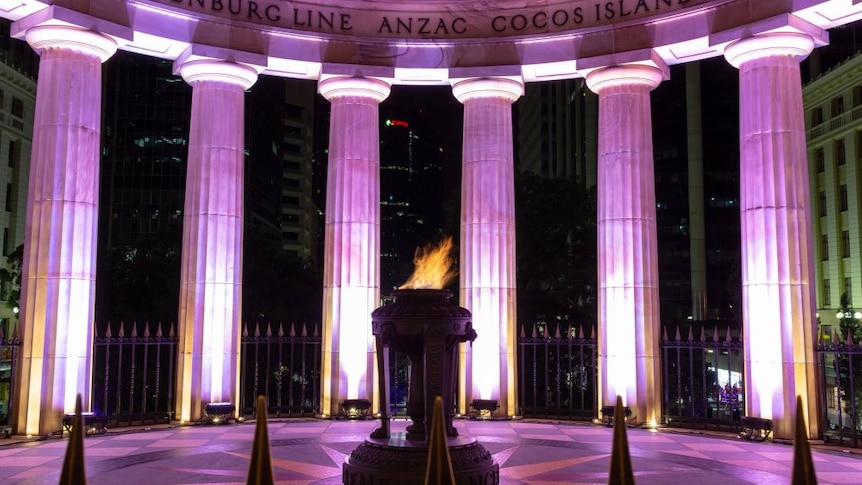 The eternal flame is lit at Anzac square where people are beginning to gather.