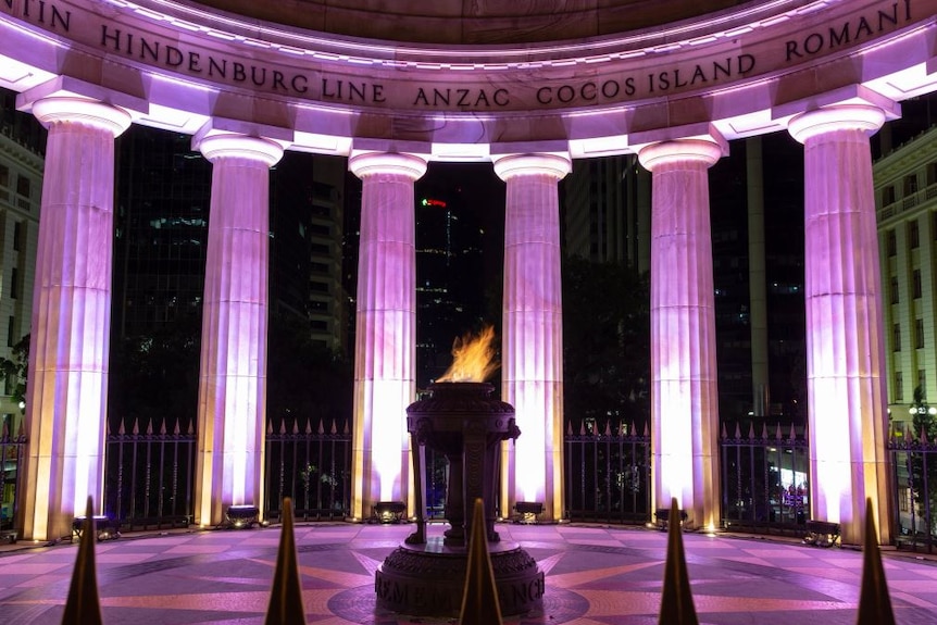 The eternal flame is lit at Anzac square where people are beginning to gather.