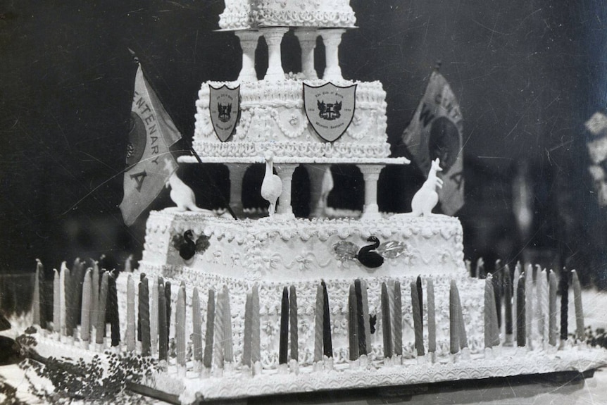 The 1929 centenary cake with 100 candles.