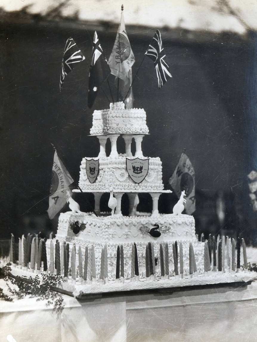 The 1929 centenary cake with 100 candles.