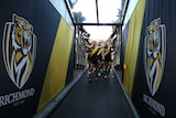 Jason Castagna leads Richmond off the MCG off after their win against the Western Bulldogs.