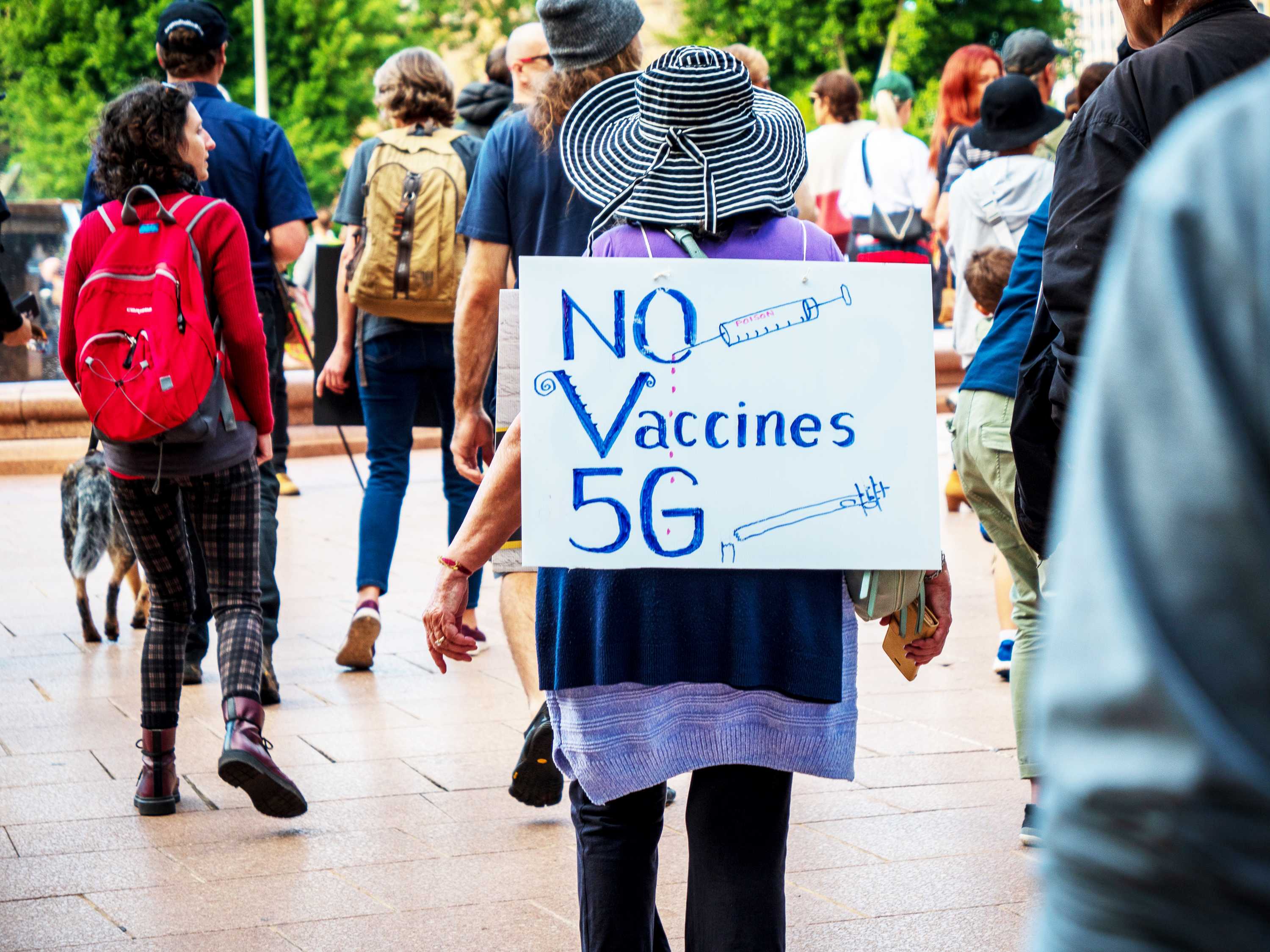 A demonstrator attends an anti-vaccination rally in Sydney.
