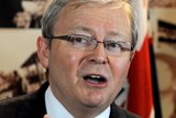 Former foreign minister, Kevin Rudd, speaks to the media after returning from the US.