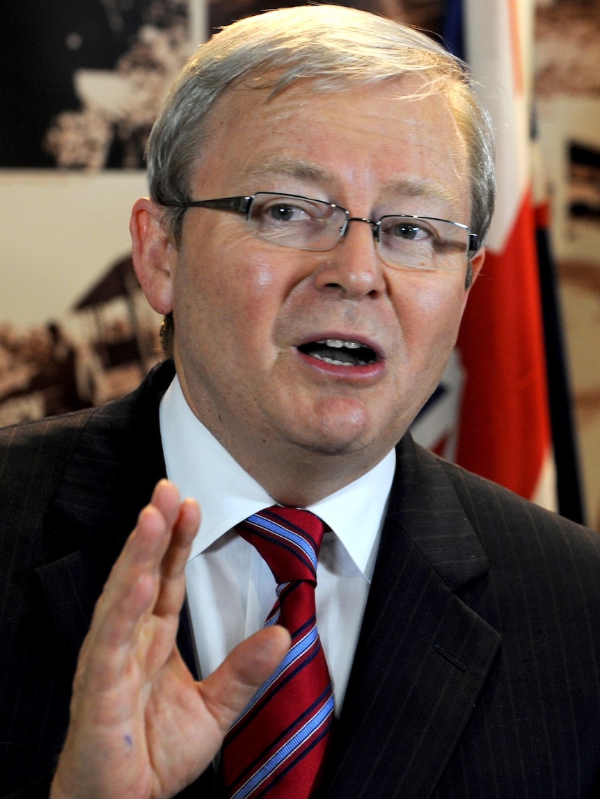 Former foreign minister, Kevin Rudd, speaks to the media after returning from the US.