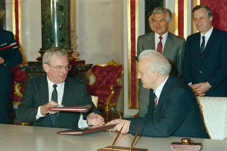 Bill Hayden sits with Russian Foreign Minister Shevardnadze in Moscow in 1988, with Prime Minister Bob Hawke standing behind.
