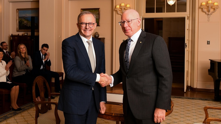 Anthony Albanese and David Hurley shake hands.