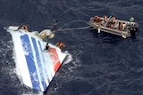 Brazilian Navy sailors retrieve the tail of Air France flight AF447