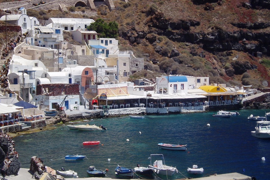 Boats moored in Oia port