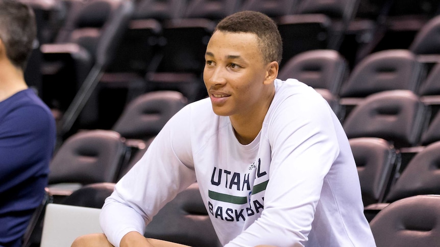 Dante Exum sits in the stands