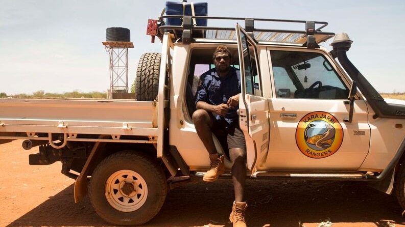 Karrajarri Indigenous Rangers sit in the cab of a 4WD truck on Karrajarri lands in the Kimberley Region of WA. 30/3/17