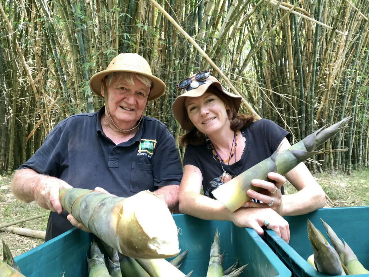 Durnford and Becky Dart showing the freshly harvested shoots to the camera.