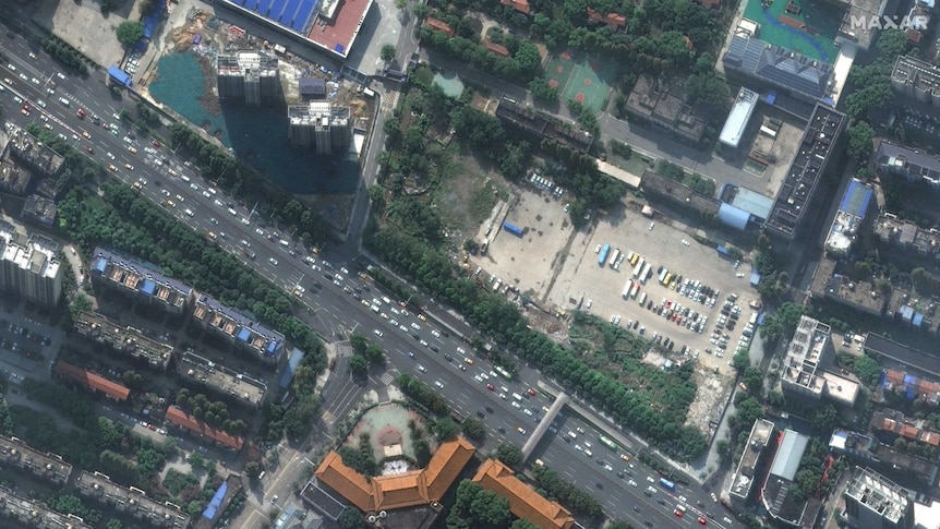 Satellite imagery shows a busy road running through Wuhan, China.