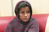 Girl allegedly about to be used as suicide bomber.