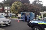 Police outside a property in Cooee where a man was shot