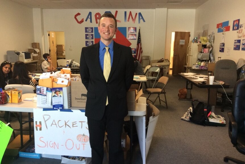 Matthew Newton stands in The Democratic Party campaign office