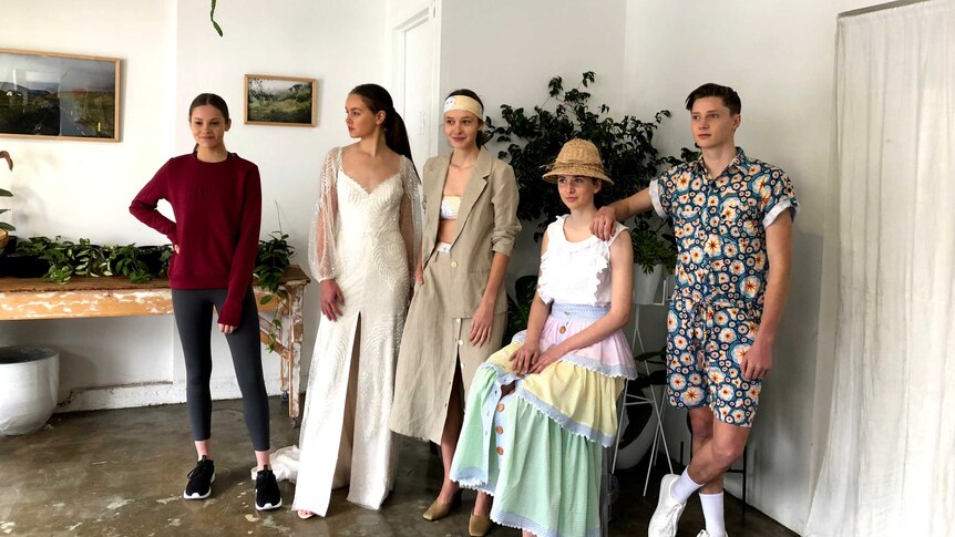 Models wearing clothes made from vintage and dead stock fabric.