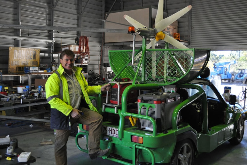 Allan Lear with a custom-built Mini Moke.