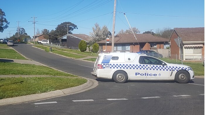 A police car blocking off a road in Ballarat where a wall collapsed