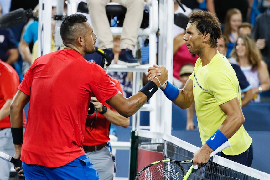 Nick Kyrgios shakes hands with Rafael Nadal after his win at the Cincinnati Open.