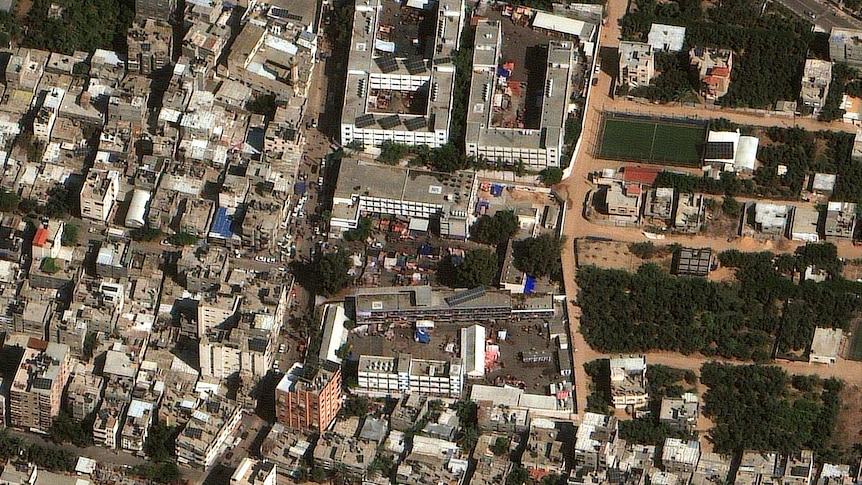 A satellite image showing buildings and streets in a densely buitl city