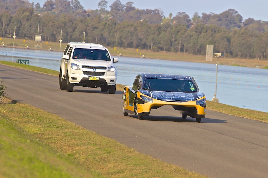 Sunswift eVe is tested, with a support vehicle close behind