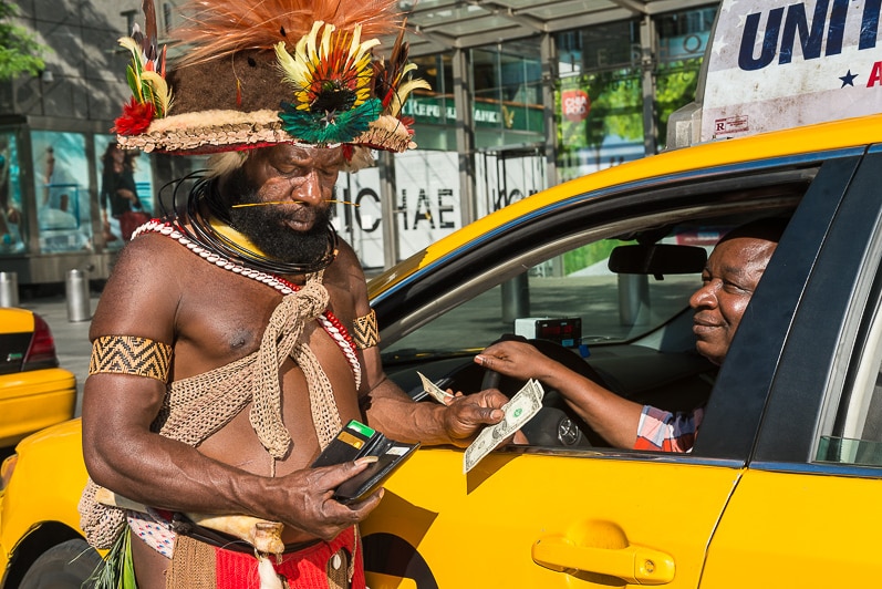The Huli chief paying his taxi fare in Manhattan  in New York City.