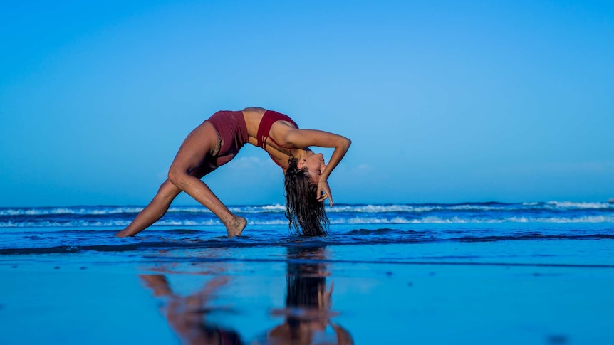 Lara in a back-bending, heart-opening pose Wild Thing